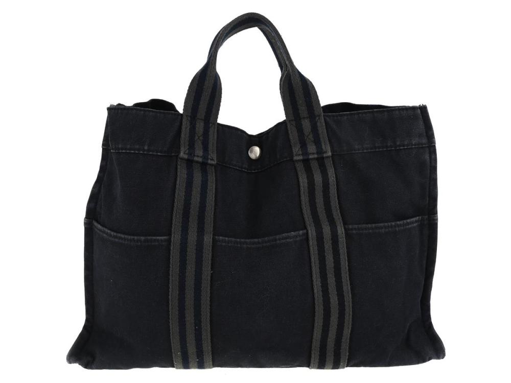 Accessories

Handbags

BAG, HERMÈS, Fourre Tout MM Totebag, blue, grey, canvas, silver-tone hardware, 42x28x10 cm, signs of wear.