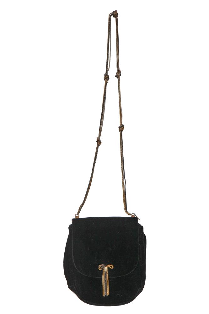 An Yves Saint Laurent black velvet handbag, circa 1970

An Yves Saint Laurent black velvet handbag, circa 1970

stamped to interior, with two inner pockets, gold, silver and gunmetal grey snake chain tassel to clasp, similar tri-metal snake chain strap with knots, 16x21cm, 6x8in

Share this lot: