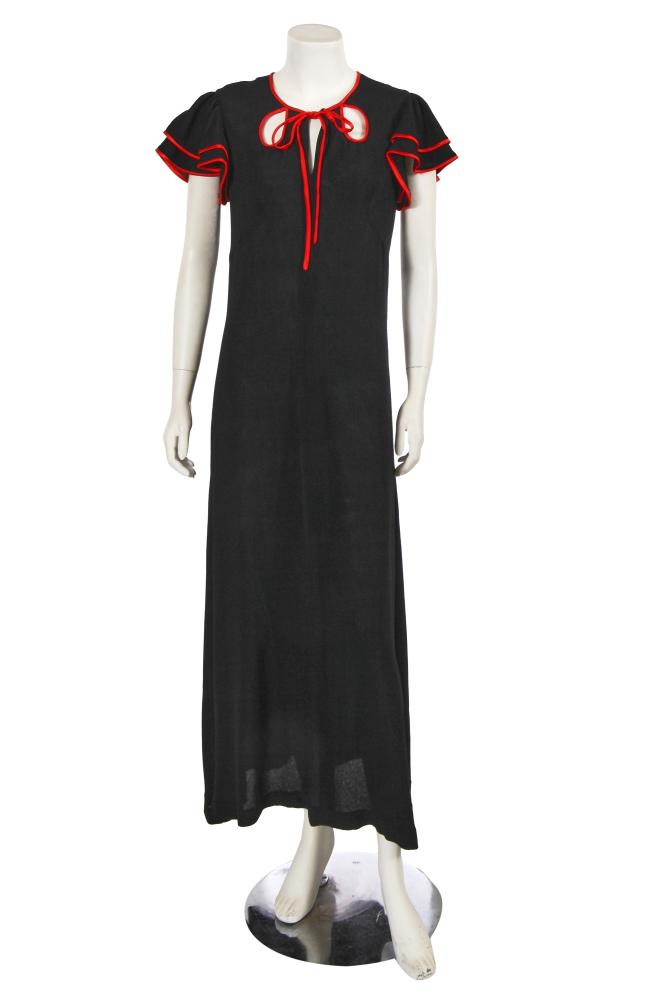 An Ossie Clark for Radley black and red moss crêpe dress, circa 1972

An Ossie Clark for Radley black and red moss crêpe dress, circa 1972

labelled, size 16, of black moss crêpe, with double-layered frilled sleeves, the cut-out neckline trimmed with red satin binding, bust 86cm 34in

Share this lot:
