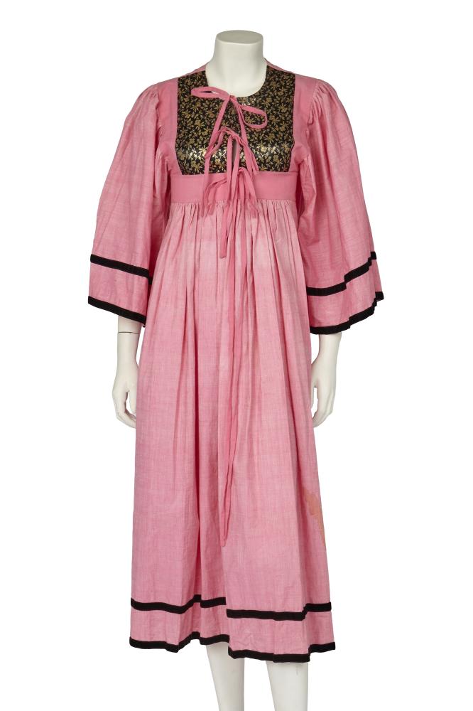 A Thea Porter pink cotton summer dress, 1970s

A Thea Porter pink cotton summer dress, 1970s

Couture labelled, smock-style, the yoke inset with black and gold brocaded silk, the flared sleeves and hem trimmed with black velvet ribbons, bust 81-86cm 32-34in

Provenance: the late Lola Yearwood collection

Share this lot: