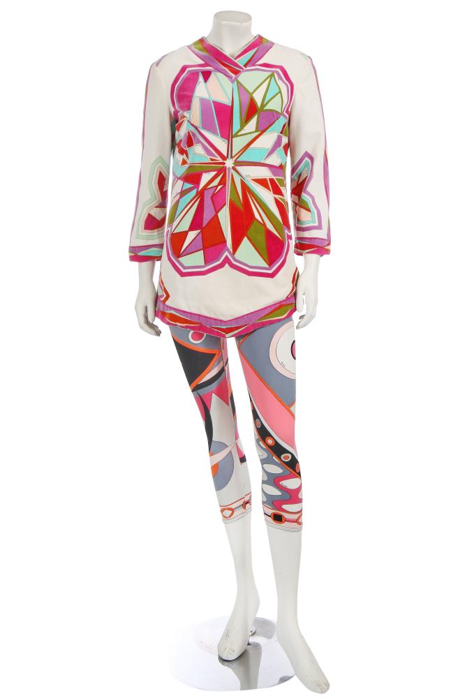 An Emilio Pucci printed tunic and leggings ensemble, 1960s

An Emilio Pucci printed tunic and leggings ensemble, 1960s

comprising: a velvet tunic top printed with colourful geometric abstract designs with pointed neckline and hem, labelled and Saks Fifth Avenue label, bust 91cm 36in; a pair of polyamide leggings printed in shades of pink, orange, grey and black, labelled and dated 1967, size L, waist 66-91cm 26-36in (2)

Share this lot: