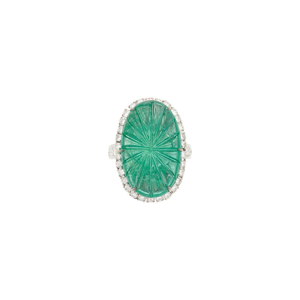Property from a Prominent Maryland CollectionOne oval carved cabochon emerald ap. 20.00 cts., 54 round diamonds ap. 1.55 cts., signed Webb, ap. 8.4 dwts. Size 8 1/2.

Emerald: medium green, moderately included, several surface-reaching, several small chips, translucent, good polish.Diamonds: G-H-I-VS.Width 1 inch.                            
Any condition statement is given as a courtesy to a client, is an opinion and should not be treated as a statement of fact and our Organization shall have no responsibility for any error or omission. Please contact the specialist department to request further information or additional images that may be available.