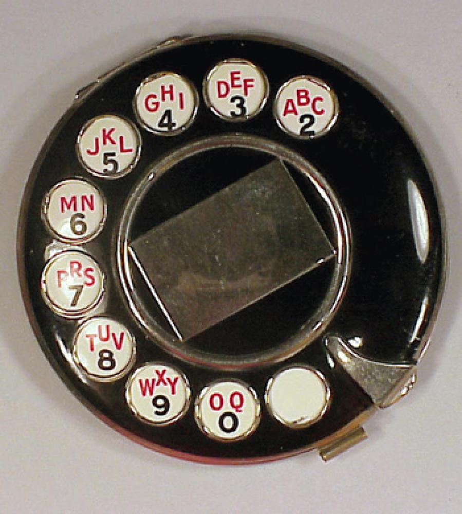 Telephone Compact

Lot 208
Telephone Compact
 Possibly Schiaparelli 
 Black enamel with white dials, marked: Made in France.