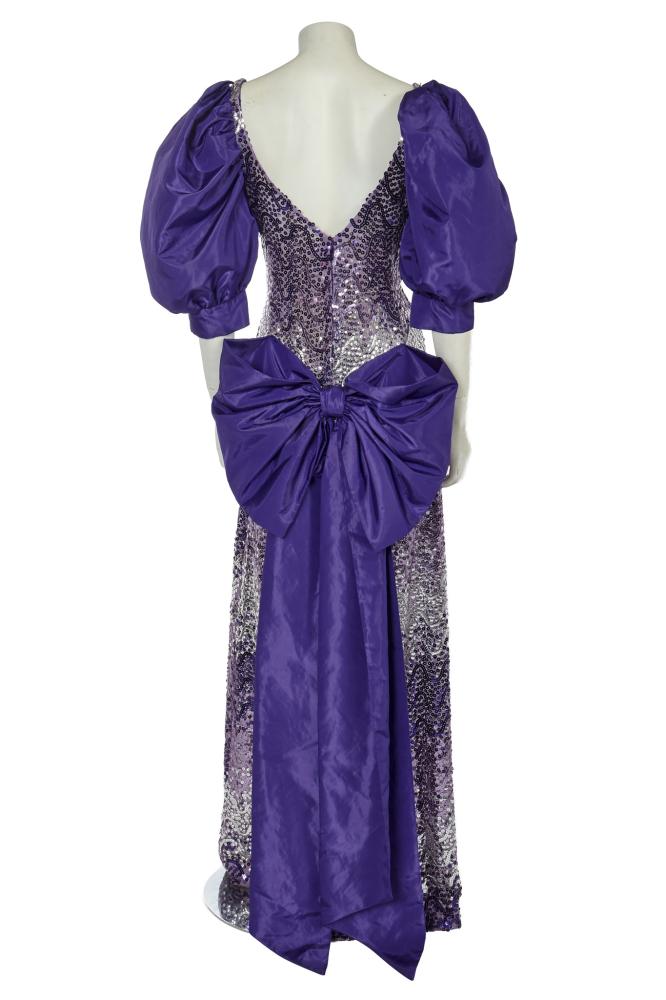 A Loris Azzaro silver and purple sequined evening gown, probably early 1980s

A Loris Azzaro silver and purple sequined evening gown, probably early 1980s

labelled, the sequined Schläpfe chiffon with undulating sequin bands and degradé sequins in shades of purple and silver, purple taffeta puff sleeves and large rear bow, bust approx 86cm 34in

Share this lot: