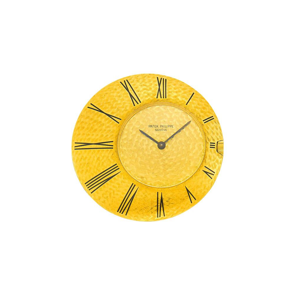 18 kt., mechanical, round patterned numberless gold dial, black hands, round case of similar pattern with graduating black Roman numerals, glass crystal, case diameter ap. 39 mm., dial, movement and case signed Patek Philippe, movement no. 798493, case no. 318484, circa 1960s, ap. 33.4 dwts. gross.Notes:The Ricochet collection was the brainchild of watch and jewelry designer Gilbert Albert. Hired as a young 25 year old to direct the workshop at Patek Philippe, his love and passion of mid-century, futuristic and nature-inspired designs took the company in to new territory. This ricochet pocket watch evokes the child in us to skim rocks across the surface of a lake.

The movement is currently running, but slow. Recommend service for cleaning of movement.Case diameter 1 9/16 inches.                             
Any condition statement is given as a courtesy to a client, is an opinion and should not be treated as a statement of fact and our Organization shall have no responsibility for any error or omission. Please contact the specialist department to request further information or additional images that may be available.