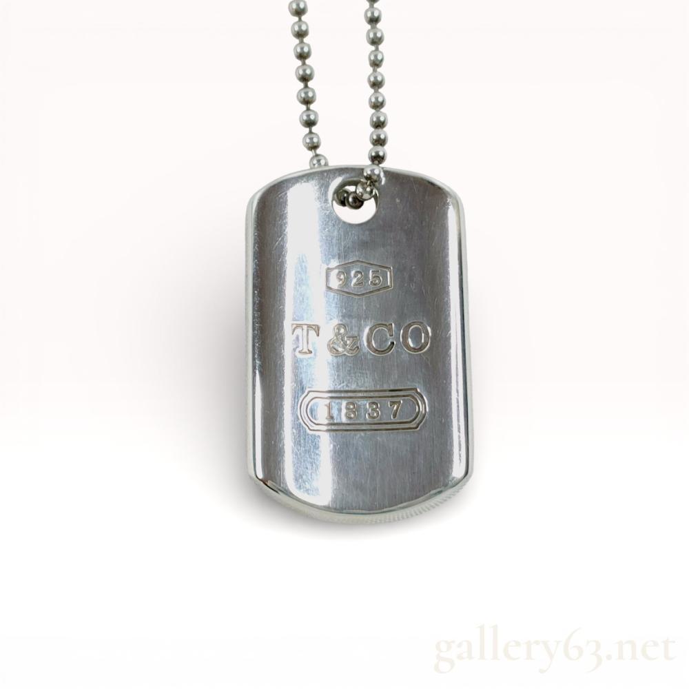 Description
Authentic Tiffany & Co. 1837 Dog Tag necklace made of sterling silver. Weighing 22.6 grams. Marked for sterling and Tiffany & Co hallmarks.