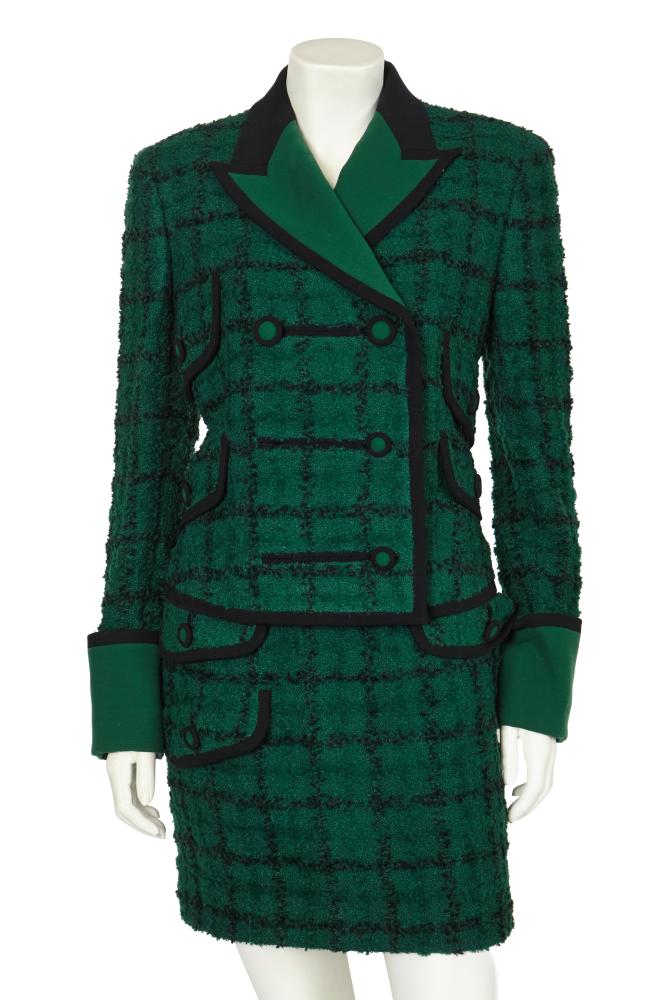 A Gianni Versace green and black bouclé suit, Autumn-Winter 1993-94

A Gianni Versace green and black bouclé suit, Autumn-Winter 1993-94

labelled, the cropped jacket with contrasting black and green notched lapels, black and green buttons, asymmetric flap pockets, bust 91cm 36in; the matching mini skirt with three flap pockets to front, waist 66cm 26in (2)

Share this lot: