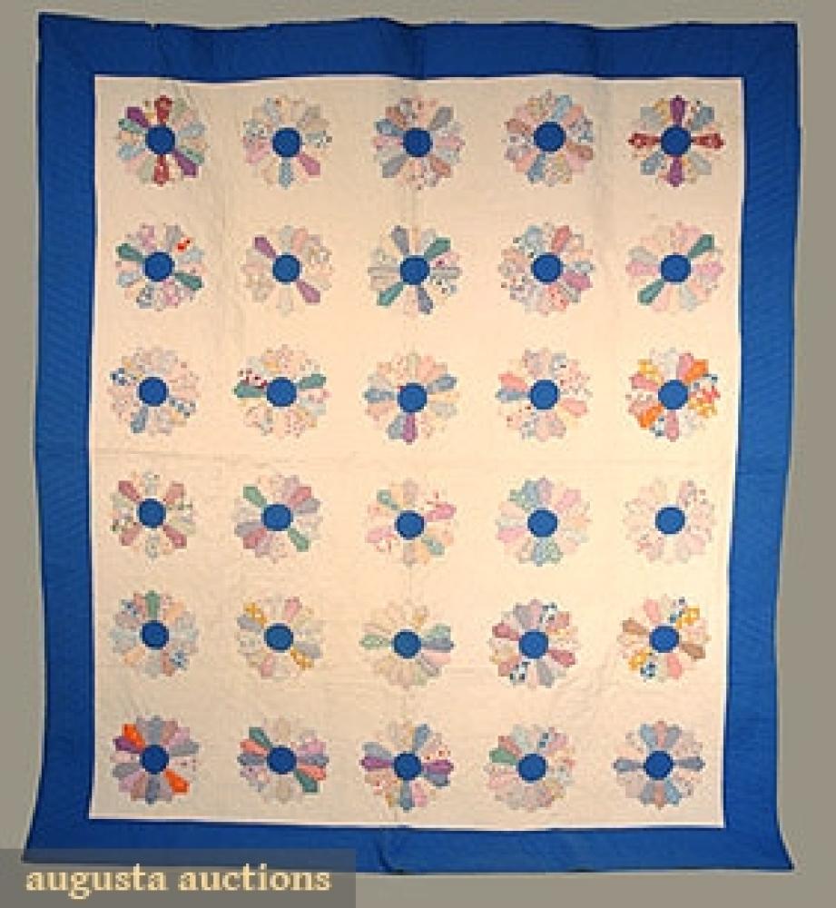 PIECED SUNFLOWER QUILT, 1930s

Blue centered flowers w/ pastel printed cotton petals on white ground w/ blue border, hand quilted all over, 86" x 90", (some small tears & breaks) good.		
Bid Online
Price Realized: $126.50Category:TextilesEra:1920-1949
11.6956.790.32