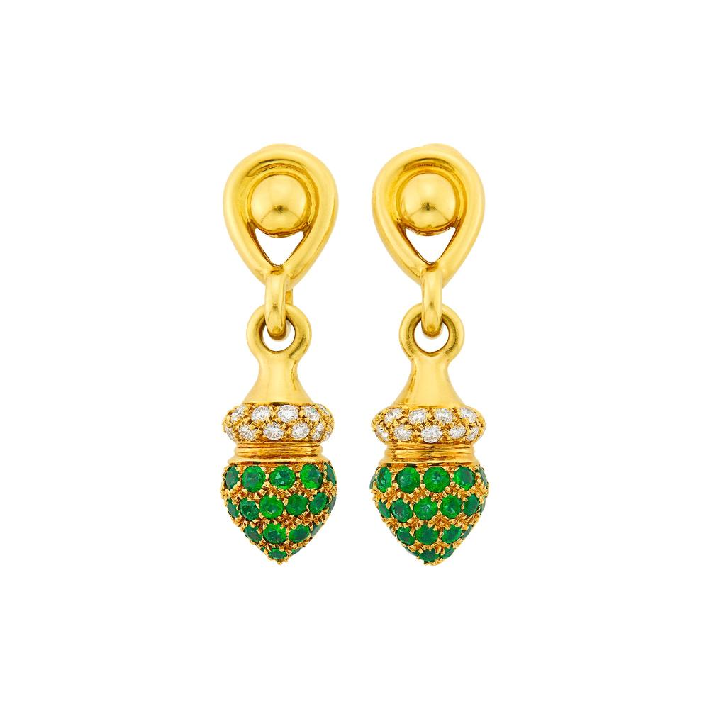 The Martin and Lynn Halbfinger Collection18 kt., 26 round diamonds ap. 1.15 cts., 42 round emeralds ap. 1.85 cts., signed Boucheron Paris, no. 20145, ap. 16.7 dwts.

Emeralds: medium deep green, cleanish to slightly included, lively.Diamonds: G-H-VSClip-backs. 1 3/4 x 1/2 inches.                            
Any condition statement is given as a courtesy to a client, is an opinion and should not be treated as a statement of fact and our Organization shall have no responsibility for any error or omission. Please contact the specialist department to request further information or additional images that may be available.