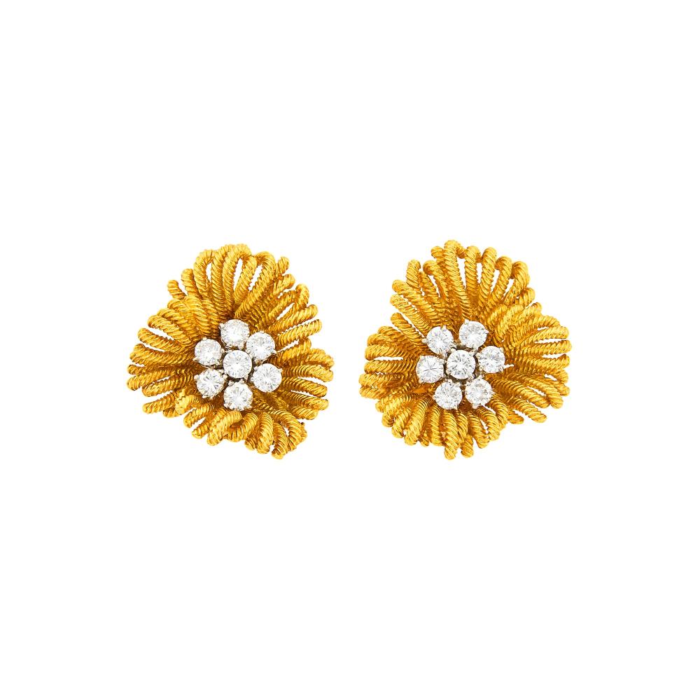 Property of an Upper East Side Collector18 kt., 14 round diamonds ap. 1.95 cts., signed Van Cleef & Arpels, Made in France, no. 3V101.12, with maker’s mark, ap. 14.7 dwts.

Diamonds: G-H-I-VS.Clip-backs. 15/16 x 7/8 inch.                            
Any condition statement is given as a courtesy to a client, is an opinion and should not be treated as a statement of fact and our Organization shall have no responsibility for any error or omission. Please contact the specialist department to request further information or additional images that may be available.
