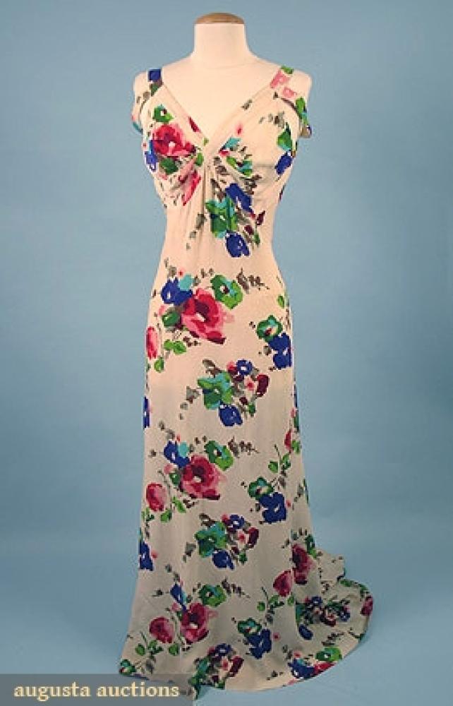 PRINTED SUMMER GOWN, 1930s

Ivory silk crepe w/ water-color floral print, bias-cut, small train, low back w/ self-covered buttons, B 36", W 28", H 40", Front L 58", Back L 66", (button losses, underarm stains, dress dingy) good.		
Bid Online
Price Realized: $287.50Category:WomensEra:1920-1949
11.7584.297.511