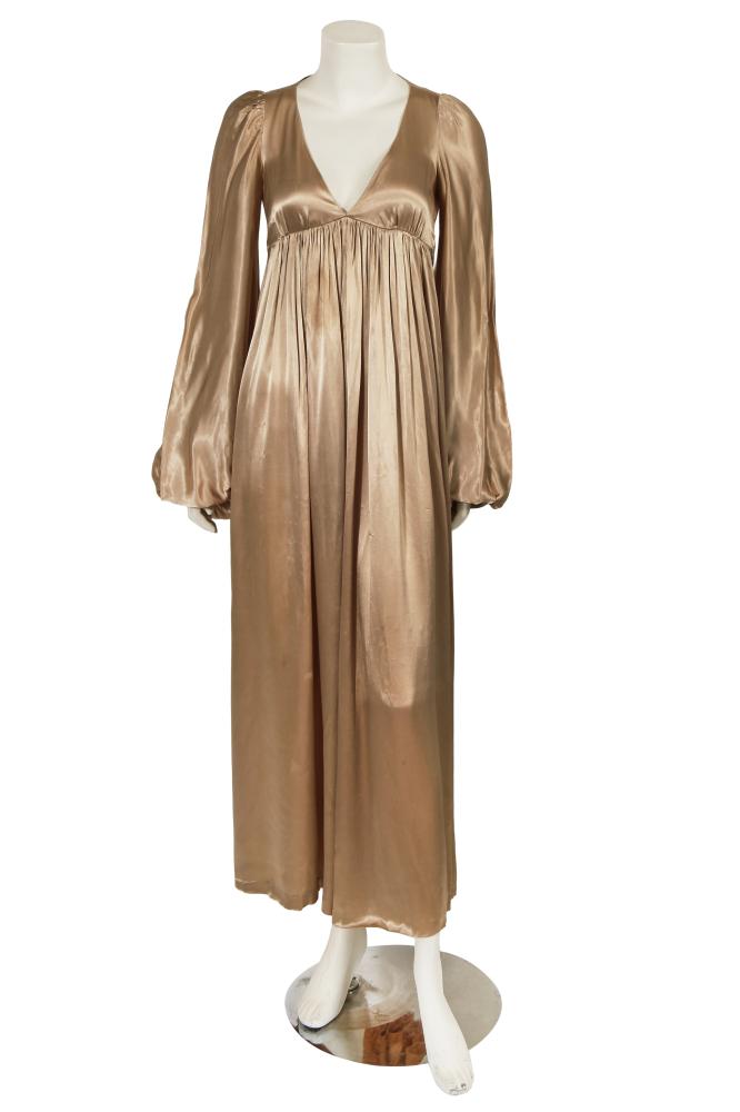 A Biba champagne satin dress, circa 1969

A Biba champagne satin dress, circa 1969

woven art nouveau label, the fabric gathered to the empire line bust, with bishop sleeves, V-neck, integral ties to waist, bust 86cm 34in

Share this lot: