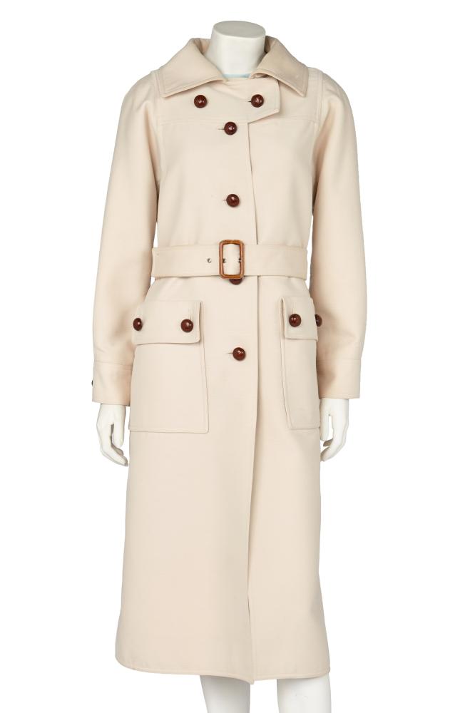 An André Courrèges ecru textured cotton coat, late 1970s

An André Courrèges ecru textured cotton coat, late 1970s

unlabelled but with printed ac logo lining, with faux brown leather buttons, broad closure flap to neck, patch pockets, matching belt with brown leather buckle, bust approx 102cm, 40in; together with an André Courrèges blue and white checked knit sleeveless top with white neck zip, embroidered ac logo, bust 91cm 36in (2)

Share this lot: