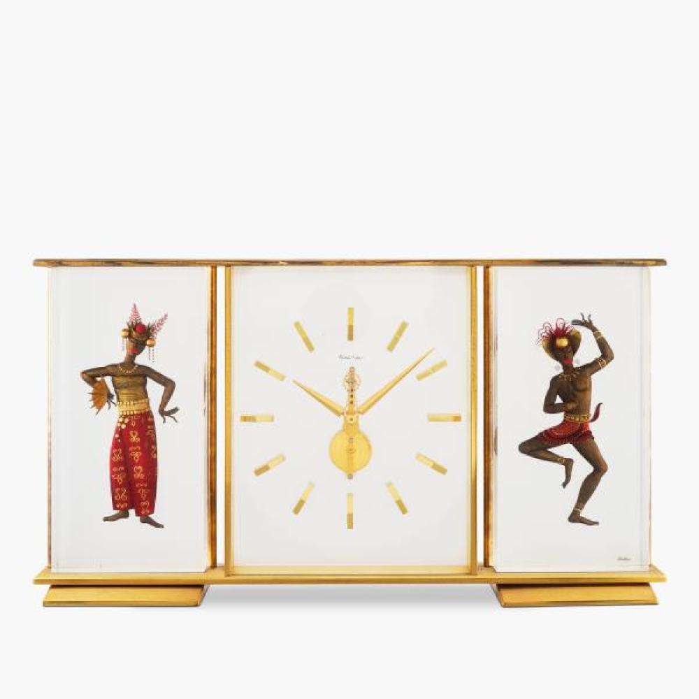 Jaeger-LeCoultre

Jaeger-LeCoultre

"Marina"

A gilt brass desk clock with motif of two Indonesian dancers, Circa 1960

Dial: off-white

Calibre: mechanical, jewelled

Case: gilt brass

Case number: 389

Size: 410 mm width x 220 mm height

Signed: front glaze

Accessories: none

積家 "Marina"

銅鍍金座鐘，飾以兩個印尼舞者，約1960年製

Please note that the movement has not been tested for the accuracy of time and may need a service at the buyer’s expense.

Sotheby’s does not guarantee the future working of the movement and we do not guarantee the authenticity of any individual component parts since subsequent repairs and restoration work may have resulted in the replacement of original parts. You are advised that watch straps or bands made of materials derived from endangered or otherwise protected species (i.e. alligator or crocodile) are not sold with the watch and we reserve the right to remove these straps or bands prior to shipping. Furthermore, the watch may not come with its original manufacturers strap or band.

Prospective bidders should review the Conditions of Business, Authenticity Guarantee, the Guide for Prospective Buyers, and any Important Notice in the sale catalogue.

"In response to your inquiry, we are pleased to provide you with a general report of the condition of the property described above. All dimensions in catalogue descriptions are approximate. Condition reports may not specify mechanical replacements or imperfections to the movement, case, dial, pendulum, separate base(s) or dome. Watches in water-resistant cases have been opened to examine movements but no warranties are made that the watches are currently water-resistant. Please note that we do not guarantee the authenticity of any individual component parts, such as wheels, hands, crowns, crystals, screws, bracelets and leather bands, since subsequent repairs and restoration work may have resulted in the replacement of original parts. Since we are not professional conservators or restorers, we urge you to consult with a restorer or conservator of your choice who will be better able to provide a detailed, professional report. Prospective buyers should inspect each lot to satisfy themselves as to condition and must understand that any statement made by Sotheby’s is merely a subjective, qualified opinion. Prospective buyers should also refer to any Important Notices regarding this sale, which are printed in the Sale Catalogue. In particular, please note it is the purchaser’s responsibility to comply with any applicable import and export matters, particularly in relation to lots incorporating materials from endangered species.NOTWITHSTANDING THIS REPORT OR ANY DISCUSSIONS CONCERNING A LOT, ALL LOTS ARE OFFERED AND SOLD AS IS" IN ACCORDANCE WITH THE CONDITIONS OF BUSINESS PRINTED IN THE SALE CATALOGUE."

**Please be advised that bands made of materials derived from endangered or otherwise protected species (i.e. alligator and crocodile) are not sold with the watches and are for display purposes only. We reserve the right to remove these bands prior to shipping."