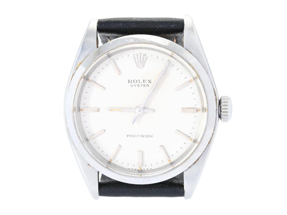 Watches

Rolex

ROLEX, Oyster, Precision (-T Swiss T-), Ref no. 6427, Serial no. 3021351, Cal 1225, Case no. 6426, men´s wristwatch, 34 mm, steel, manual winding, plastic crystal, damaged dial, defect (not working, needs overhaul), leather strap, approx. 1971.
