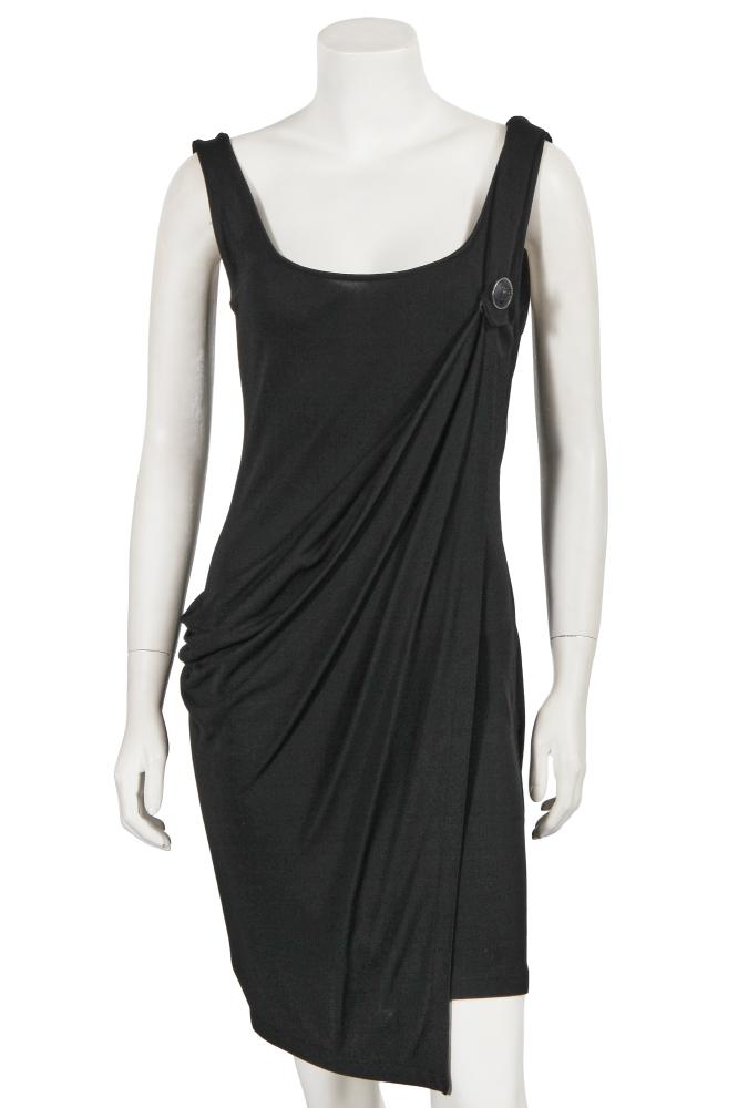 A Gianni Versace draped black rayon mini dress, early 1990s

A Gianni Versace draped black rayon mini dress, early 1990s

Couture label, with black Medusa mask button to left bust, the excess draped fabric gathered to right hip, bust 81-91cm 32-36in

Share this lot: