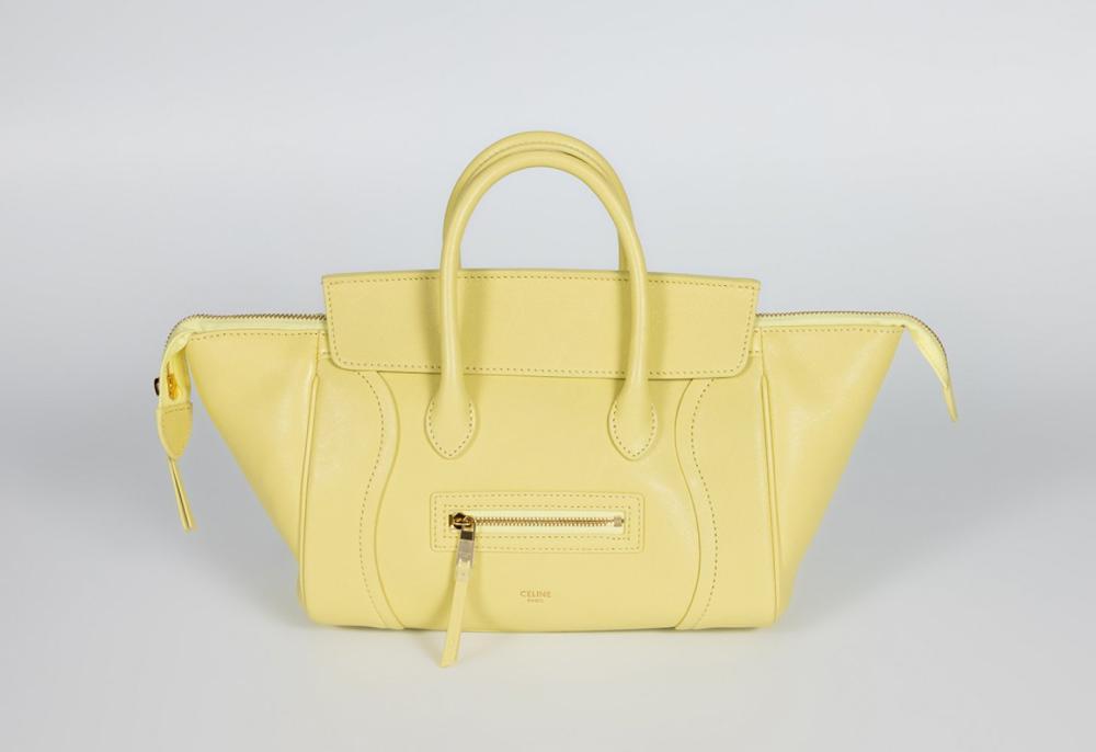 Description

CELINE
Small New Luggage bag.
Yellow lamb leather with suede lining in the same tone. Double short top handle with golden metal details. Zipper and flap closure.
In good condition, with light marks of use.
Measurements: 24 x 19 x 12 cm.

The Celine New Luggage, introduced during Phoebe Philo’s creative direction in the early 2010s, quickly became one of the most influential designs of the maison’s modern era. The New Luggage (Small) model stands out for its compact format, while maintaining the features that made the original design iconic: the curved front panels, the framed central zipper and the firm handles that enhance the bag’s geometry.

In good condition, with light marks of use.