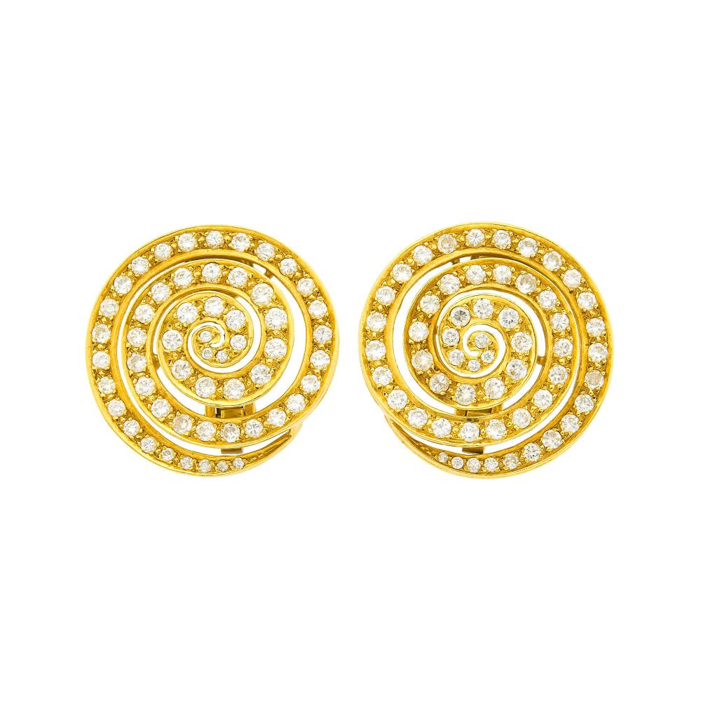 Property of a Distinguished Lady from Athens, Greece18 kt., 112 round diamonds ap. 4.00 cts., signed Bulgari NY, Italy, no. M112, ap. 13.2 dwts.

Diamonds: G-H-VSClip-backs. Diameters 1 1/8 inches.                            
Any condition statement is given as a courtesy to a client, is an opinion and should not be treated as a statement of fact and our Organization shall have no responsibility for any error or omission. Please contact the specialist department to request further information or additional images that may be available.