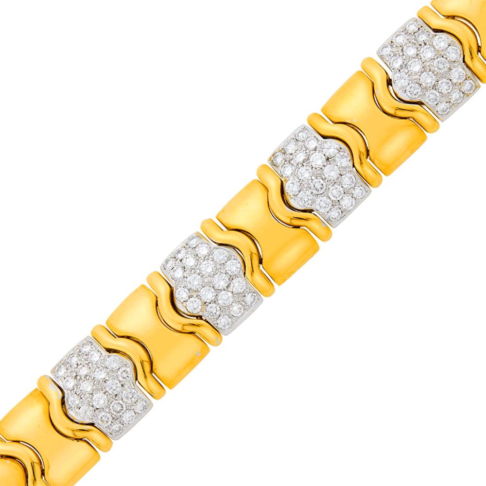 Property of a Distinguished Lady from Athens, GreeceYellow and white gold, 80 round diamonds ap. 5.50 cts., with maker’s mark r.73, ap. 63.5 dwts. Length 6 inches.

Tests as 18 kt.Diamonds: G-H-I-VS.Width just under 11/16 inch.                            
Any condition statement is given as a courtesy to a client, is an opinion and should not be treated as a statement of fact and our Organization shall have no responsibility for any error or omission. Please contact the specialist department to request further information or additional images that may be available.