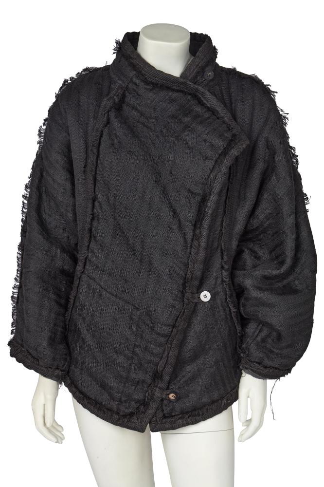 An Issey Miyake black linen-blend jacket, early 1980s

An Issey Miyake black linen-blend jacket, early 1980s

labelled, wide-cut with triangular dolman sleeves, decorative self-fringed seams, lined in tiger-print silk, bust approx 102cm 40in

Share this lot: