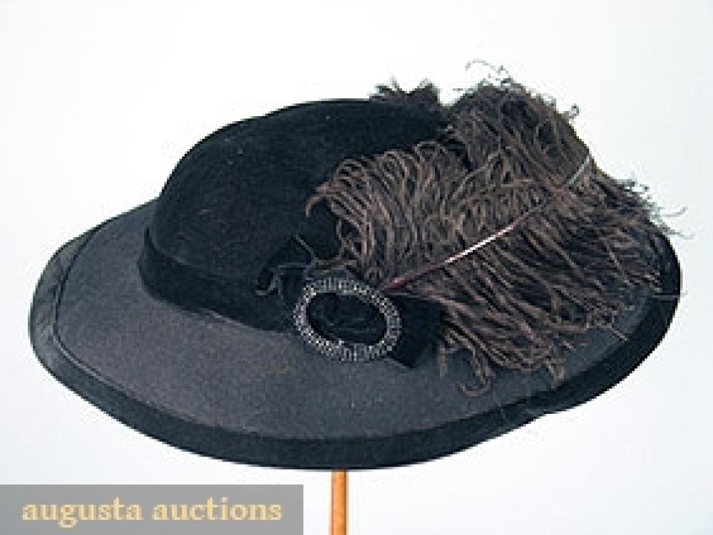 BLACK TITANIC HAT, c. 1906

Velvet & felt, trimmed w/ ostrich feathers & jet buckle, 19" brim, excellent.		
Bid Online
Price Realized: $287.50Category:HatsEra:1890-1920
11.7532.981.459