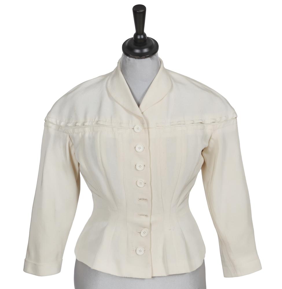 A Jeanne Paquin white silk twill jacket, early 1950s

A Jeanne Paquin white silk twill jacket, early 1950s

Couturiers Associés Paris labelled, with two horizontal pleated bands suggesting a yoke, bracelet-length sleeves, fitted waist, curved hips, bust 91cm 36in, waist 71cm 28in

Share this lot:
