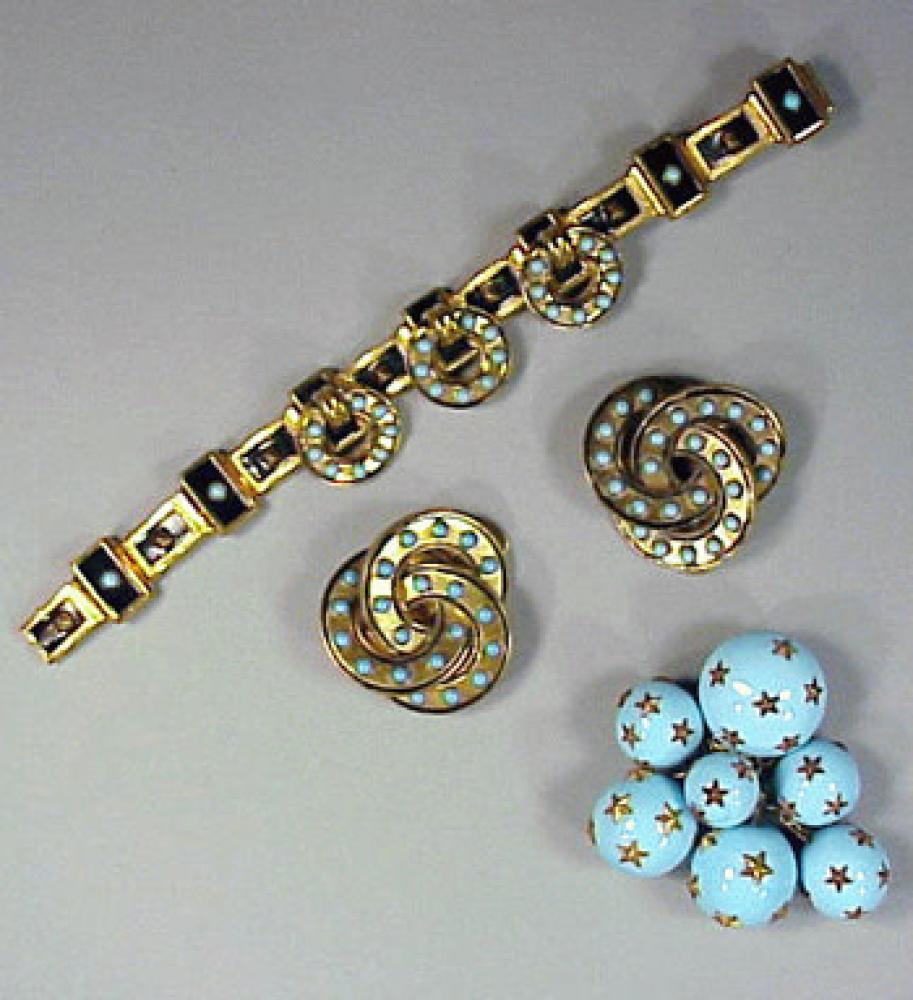 Group of Schiaparelli Jewelry 1940s

Lot 474
Group of Schiaparelli Jewelry 1940s
 1940s 
 A blue bead pendant pin, black enamel and turquoise bracelet, triple-knot earrings, the first marked: depose/France, the second unmarked, the third marked.