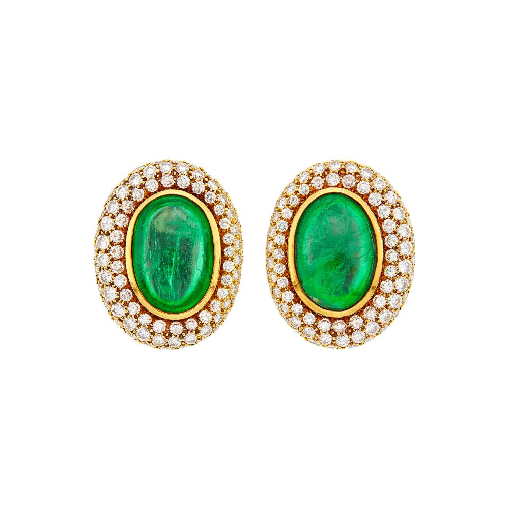 From a Private Collection18 kt., 2 oval double cabochon emeralds ap. 24.50 cts., 170 round diamonds ap. 5.65 cts., signed A. Clunn, ap. 18.8 dwts.

Emeralds: bright medium deep green, moderately included, minor surface-reaching inclusions, tranparent, good polish.Diamonds: G-H-I-VS.Clip-backs. 1 1/8 x 7/8 inches.                            
Any condition statement is given as a courtesy to a client, is an opinion and should not be treated as a statement of fact and our Organization shall have no responsibility for any error or omission. Please contact the specialist department to request further information or additional images that may be available.