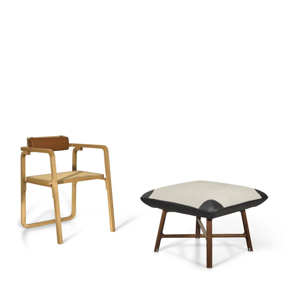 A GROUP OF TWO: A GOLD TAURILLON LEATHER, OAK WOOD & CANEWORK ORIA CHAIRA & A WHITE CANVAS & BLACK TAURILLON H LEATHER & WALNUT WOOD LES NÉCESSAIRES D’HERMÈS CARRÉ D’ASSISE LOW STOOL