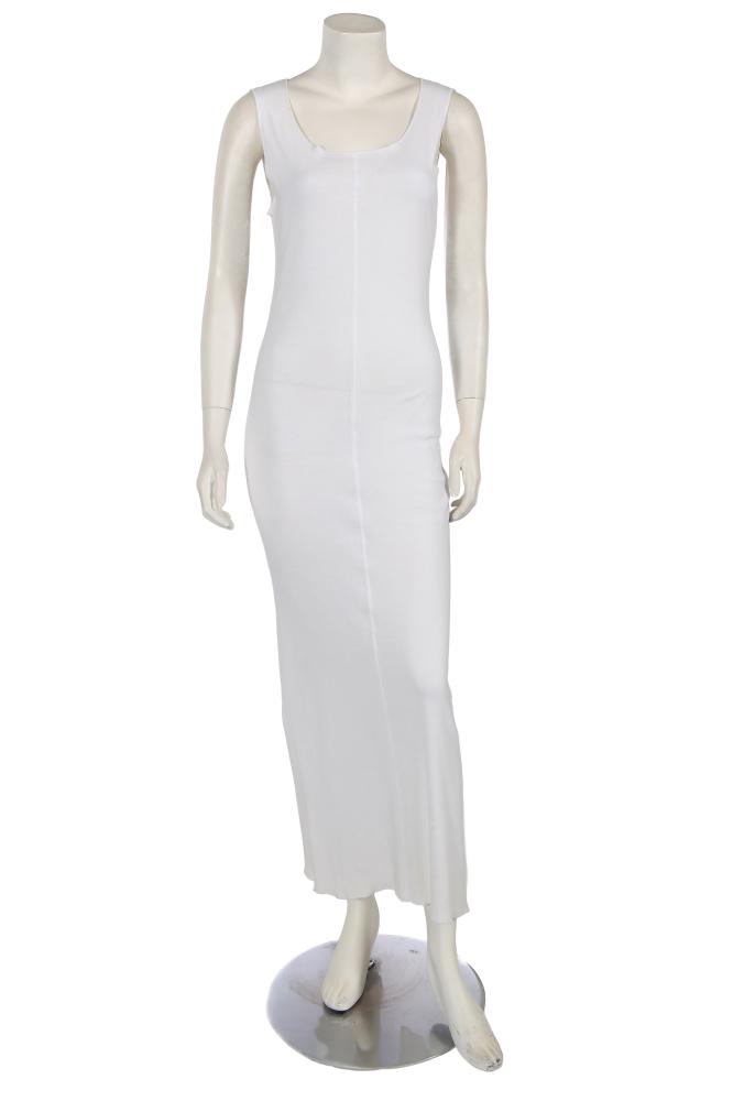 A Jean Paul Gaultier white cotton jersey dress, circa 1994

A Jean Paul Gaultier white cotton jersey dress, circa 1994

Jean’s label, of white cotton jersey with overlocked edges, central seams to front and back, embroidered logo to upper back, bust 86cm 34in; with a matching white mesh over-dress with self ties to back, pockets to front, unlabelled (2)

From the Wardrobe of Romilly, Lady McAlpine

A similar two layered ensemble was worn on the runway for the ’Les Tatouages’ collection, Spring-Summer 1994

Share this lot: