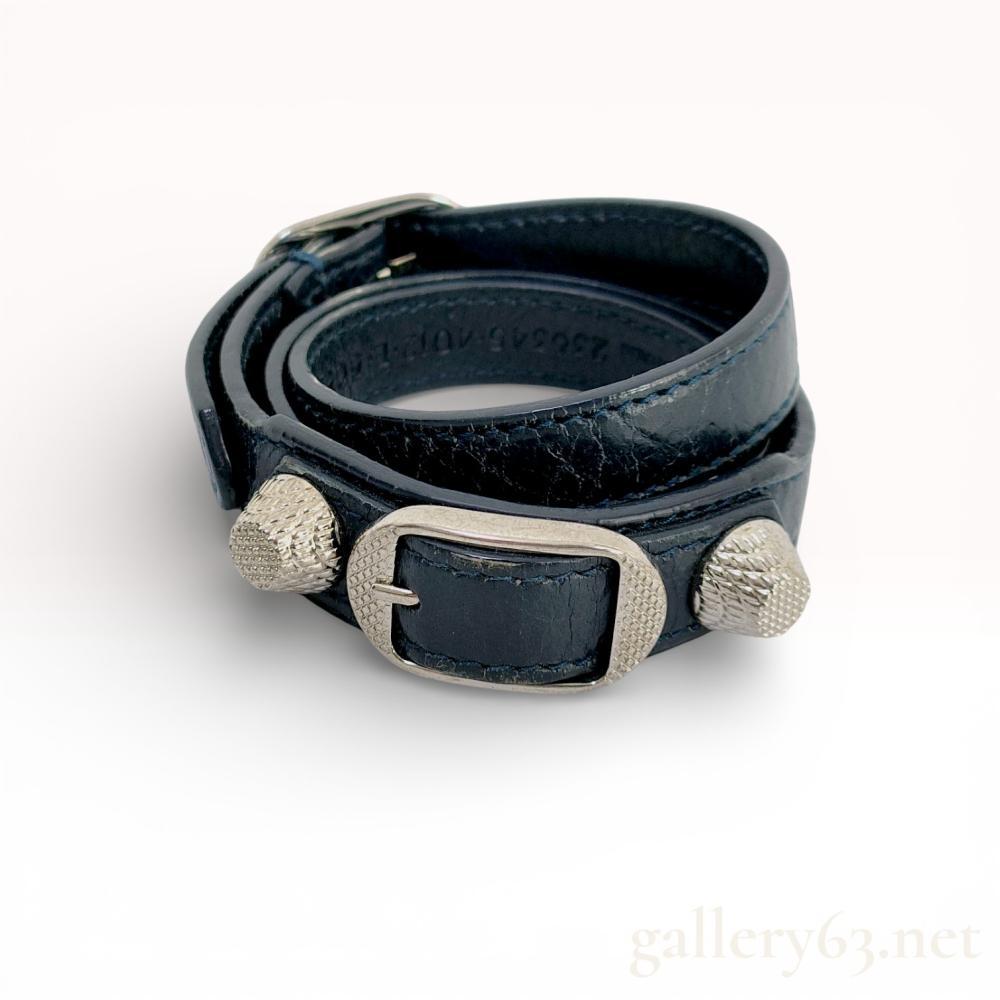 Description
Authentic Balenciaga Black Lambskin Leather Arena Giant Silver Triple Tour Bracelet.