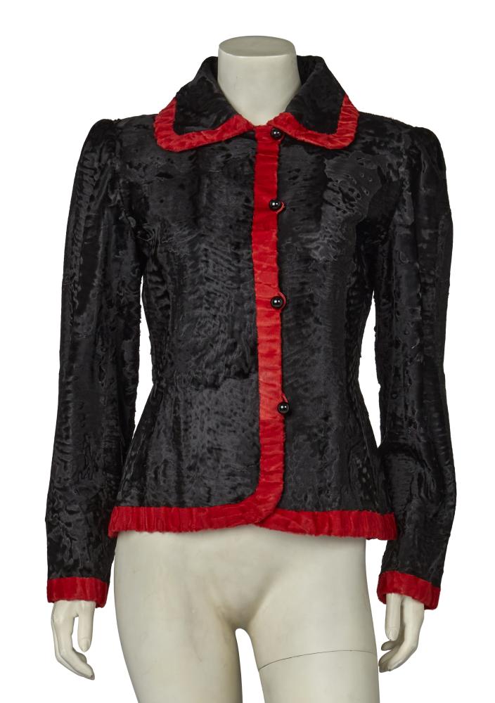 A Hubert de Givenchy haute couture black and red breitschwanz jacket, 1980s

A Hubert de Givenchy haute couture black and red breitschwanz jacket, 1980s

labelled, no bolduc, the black jacket with scarlet red trim, black bauble buttons, padded shoulders, bust 91cm 36in

Share this lot:
