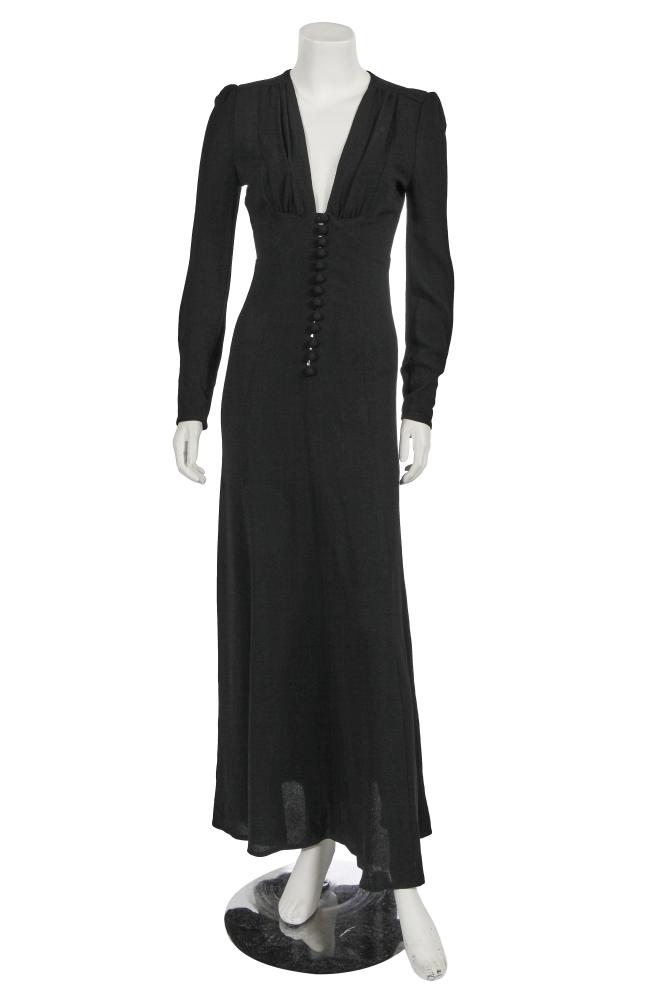 An Ossie Clark for Radley black moss crêpe evening dress, 1970s

An Ossie Clark for Radley black moss crêpe evening dress, 1970s

labelled, with V-neckline, gathers to bust, crêpe-covered buttons and loops to front closure and cuffs, bust approx 86cm 34in, waist 61cm 24in

Share this lot: