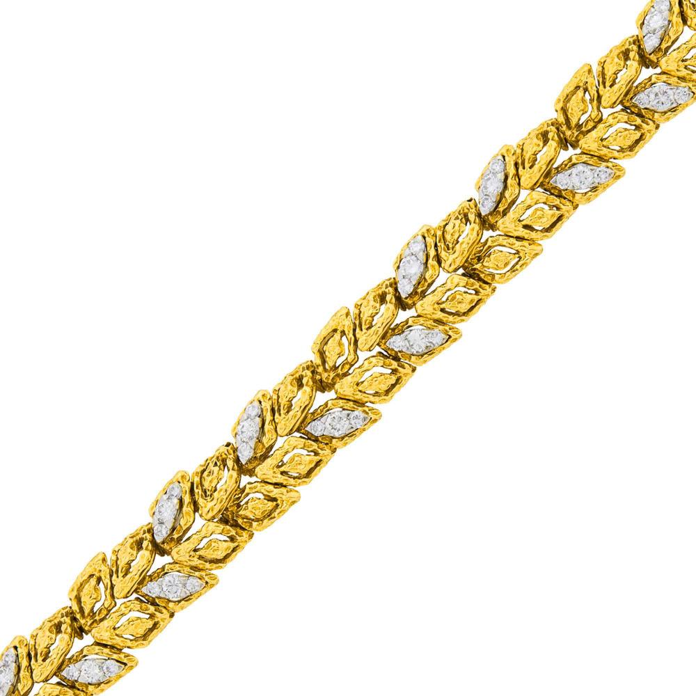 Property of a Distinguished Lady from Athens, Greece18 kt., 48 round diamonds ap. 3.35 cts., signed V.C.A., Made in France, no. obscured, with maker’s mark and French export marks, ap. 42 dwts. Length 6 1/2 inches.

Diamonds: F-G-H-VS.Width 1/2 inch.                            
Any condition statement is given as a courtesy to a client, is an opinion and should not be treated as a statement of fact and our Organization shall have no responsibility for any error or omission. Please contact the specialist department to request further information or additional images that may be available.