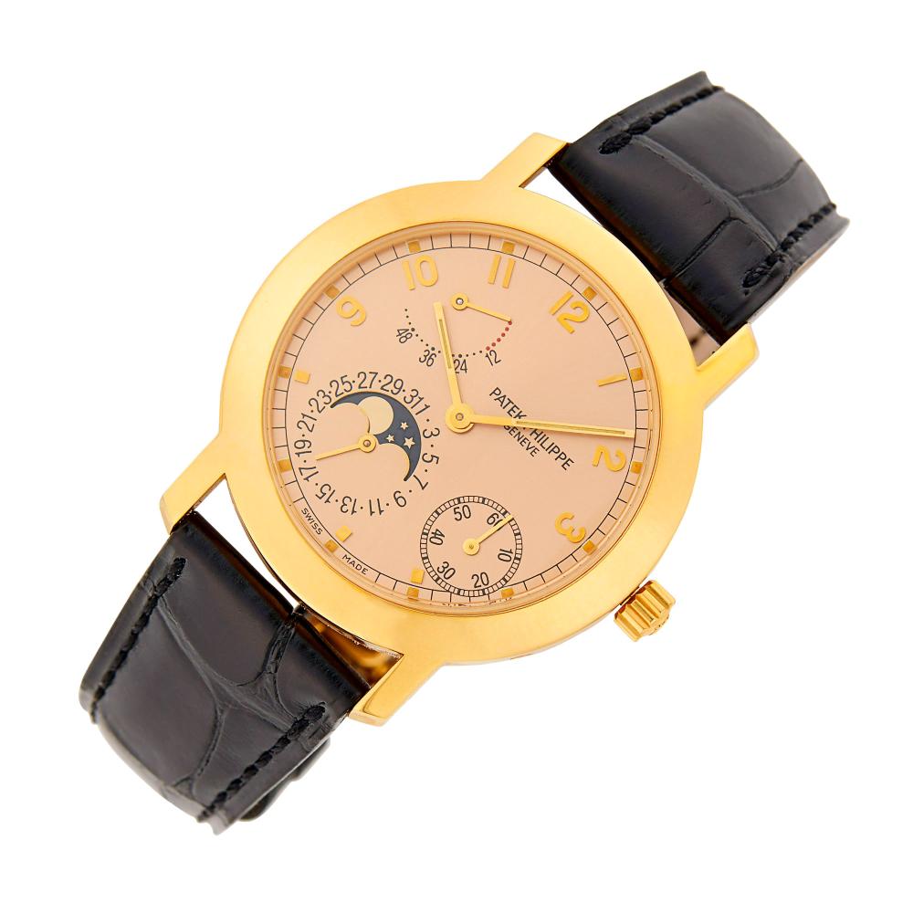 18 kt., Limited Edition 240/164, automatic, round sunburst rose gold dial, applied gold Arabic numerals and luminous hands, sector for power reserve, two subsidiary dials for seconds and date with moonphase, polished bezel with exhibition back with 22 kt. gold micro-rotor, sapphire crystal, logo crown, case diameter ap. 36 mm., black croco leather strap with rose gold deployant buckle, dial, movement, case strap and buckle signed Patek Philippe, movement no. 3111126.

The movement is currently running, but not guaranteed to be in working order. 29J.Case diameter 1 1/2 inches.                             
Any condition statement is given as a courtesy to a client, is an opinion and should not be treated as a statement of fact and our Organization shall have no responsibility for any error or omission. Please contact the specialist department to request further information or additional images that may be available.
