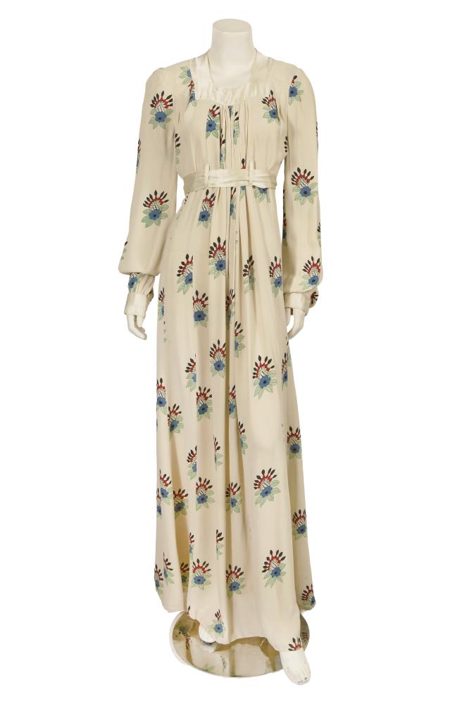 An Ossie Clark/Celia Birtwell for Radley printed ivory moss crêpe dress, circa 1974

An Ossie Clark/Celia Birtwell for Radley printed ivory moss crêpe dress, circa 1974

labelled, size 14, printed with red, blue and green floral bouquets, the bodice gathered at the front, with ivory satin cuffs, belt and square neckline, bust 91cm 36in

Share this lot: