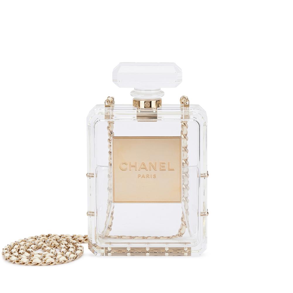 Chanel

Chanel Limited Edition Clear Lucite No. 5 Perfume Bottle Clutch with Chain Pale Gold Hardware, 2013-14

香奈兒限量版透明樹脂N°5香水瓶包，配淡金色金屬件，2013-14年

Please note that Condition 12 of the Conditions of Business for Buyers is not applicable to this lot.