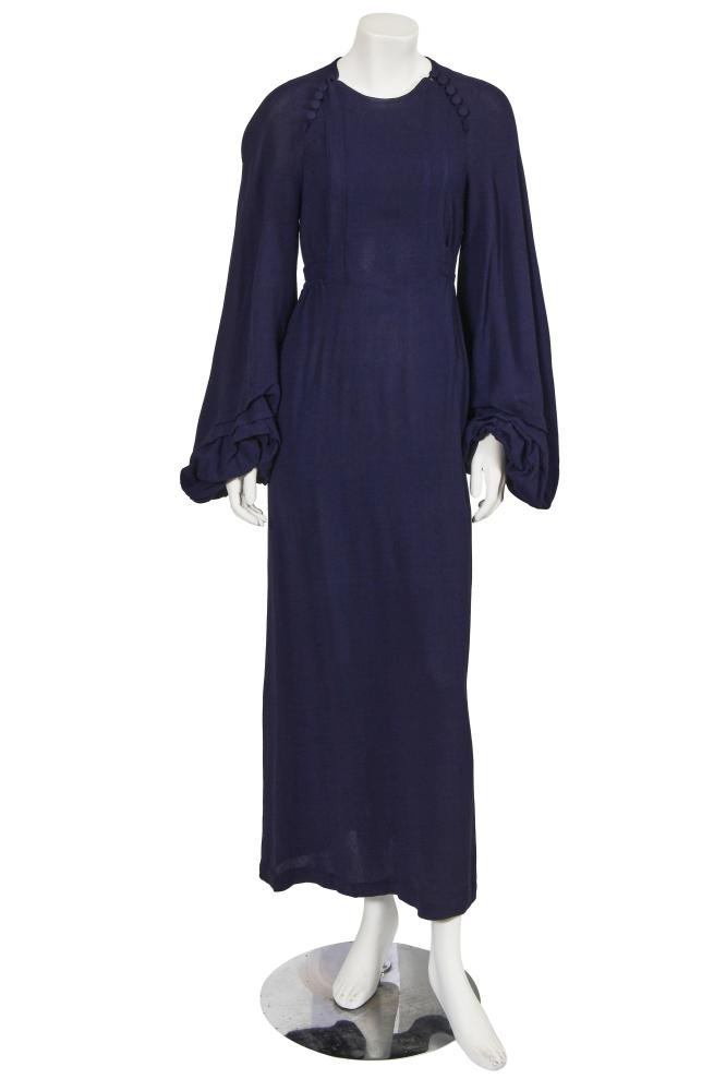 An Ossie Clark navy blue moss crêpe dress, circa 1970

An Ossie Clark navy blue moss crêpe dress, circa 1970

labelled, size 12, the 1930s-style dress with full bishop sleeves gathered to pintucked cuffs, the high neck with buttons to each shoulder, integral tie belt, bust 81cm 32in

Share this lot: