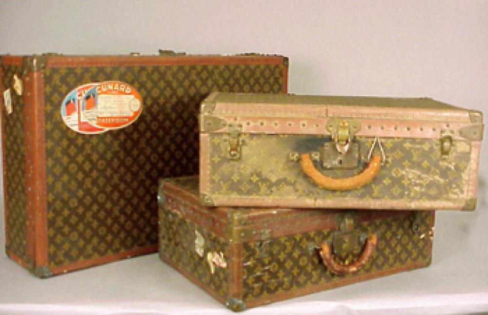 Three Louis Vuitton Suitcases

Lot 1242
Three Louis Vuitton Suitcases
 Each monogram canvas with LV stamped leather trim, brass fittings and locks, interior top trays, two with yellow monogram EMC, one with FMJ, one lock no: 1043075, each labeled: Louis Vuitton/Made In France.Height of first 20 1/2 inches, width 31 1/2 inches, depth 8 1/2 inches, height of second 15 1/4 inches, width 24 inches, depth 8 1/2 inches, height of third 16 1/2 inches, width 23 1/2 inches, depth 8 1/2 inches.
Various conditions, the first very good, handle missing, the second good, some puckering, the third worn and dirty.