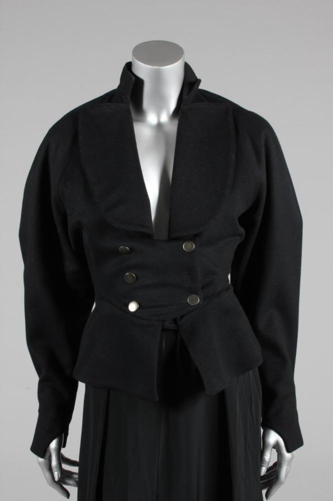 

A good Azzedine Alaia double-breasted black wool jacket, Autumn-Winter, 1986-7, labelled and size, the cut redolent of early 19th century men’s wear, the full sleeves tapering to narrow notched cuffs, chest appox 86-92cm, 34-36in



Literature: a similar jacket is illustrated in ’Azzedine Alaia in the 21st Century’ Groninger Museum exhibition catalogue p.20.
