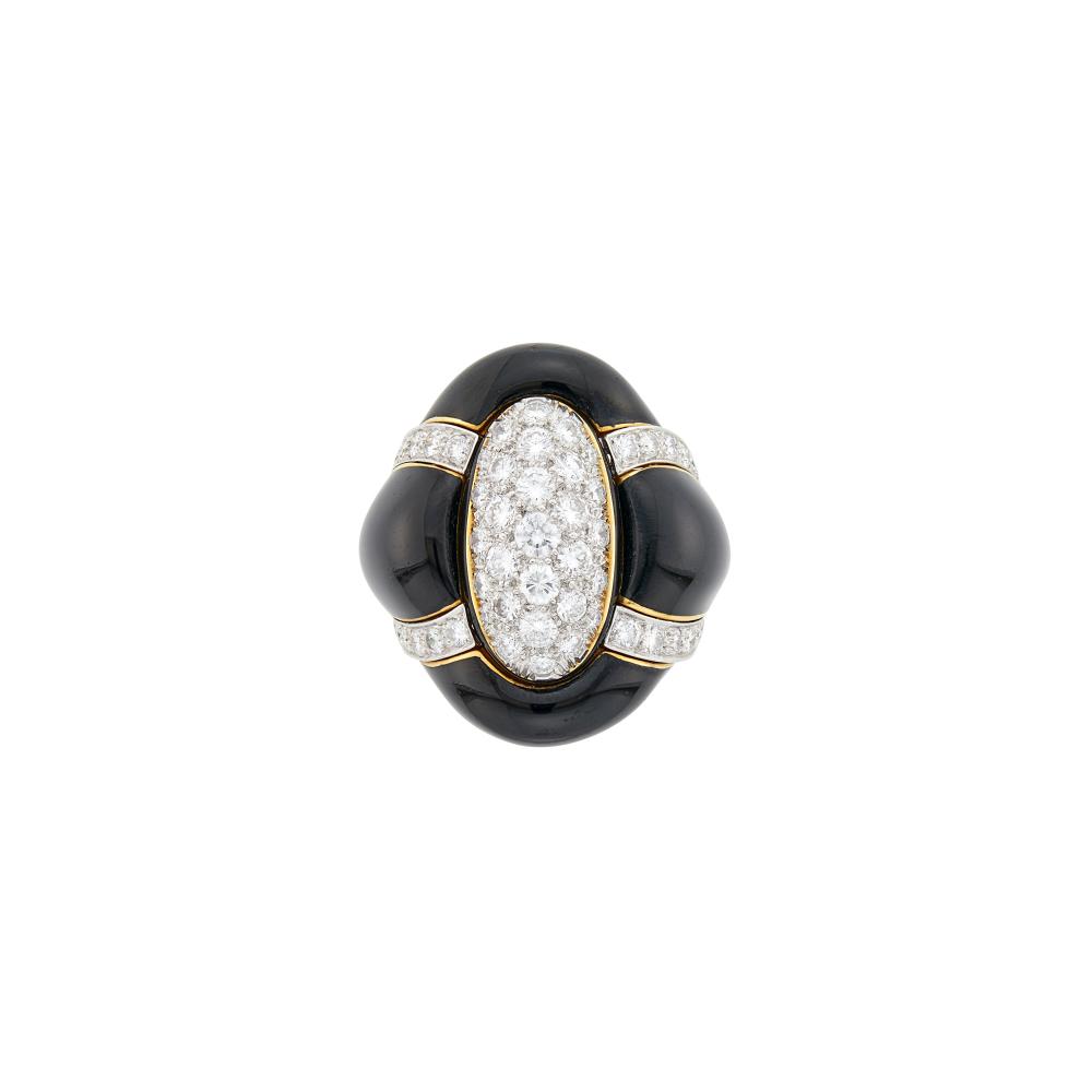 18 kt., 65 round diamonds ap. 2.65 cts., signed Webb, ap. 17 dwts. Size 6.

Diamonds: G-H-I-VS, several SI.Width 1 1/8 inches.                            
Any condition statement is given as a courtesy to a client, is an opinion and should not be treated as a statement of fact and our Organization shall have no responsibility for any error or omission. Please contact the specialist department to request further information or additional images that may be available.