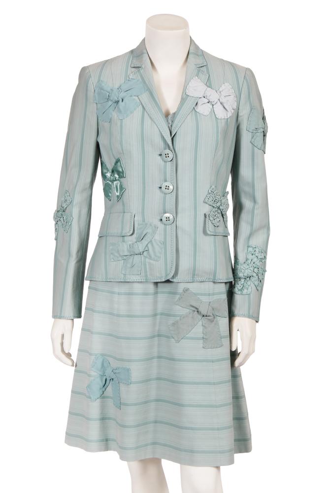 A Moschino by Rosella Jardini embroidered light blue cotton blend ensemble, Spring-Summer 2003

A Moschino by Rosella Jardini embroidered light blue cotton blend ensemble, Spring-Summer 2003

Cheap and Chic label, size 10, the self-striped blazer edged in zigzag stitches, with bow appliqués, flap pockets, notched lapels, bust 97cm 38in; the matching dress similarly decorated with bows, bust 91cm 36in (2)

Share this lot: