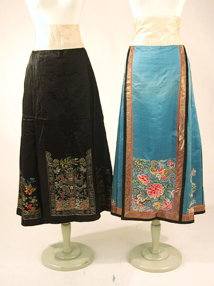 Two Chinese Silk Skirts

Lot 955
Two Chinese Silk Skirts
 20th Century 
 Comprising one blue embroidered in Peking knot stitch with butterflies, peonies and foliage, with borders of gilt ribbon, the second black woven with metallic thread dragons chasig flaming pearls. 
Good condition.
 The second purchased Anderson Galleries, New York, Robes From the Manchu Court, Gathered in Peking by Frederick Moore, March 2 & 3, 1917, lot 185. 

 Estate of Mattie-King S. Hardy