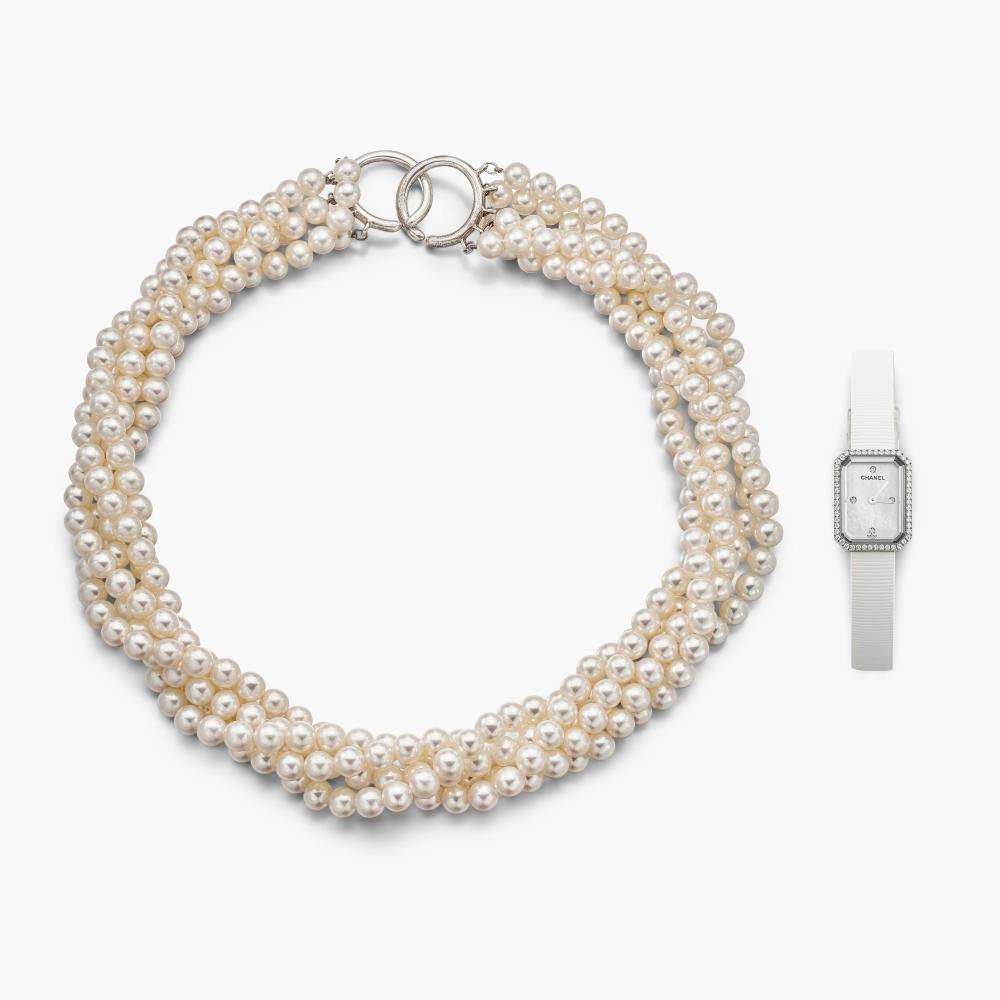Tiffany & Co. | Chanel

The five strands of round and near-round and cultured pearls, completed with two open-ended hoops; and a wristwatch with a rectangular dial, decorated with brilliant-cut diamonds, on a white strap.