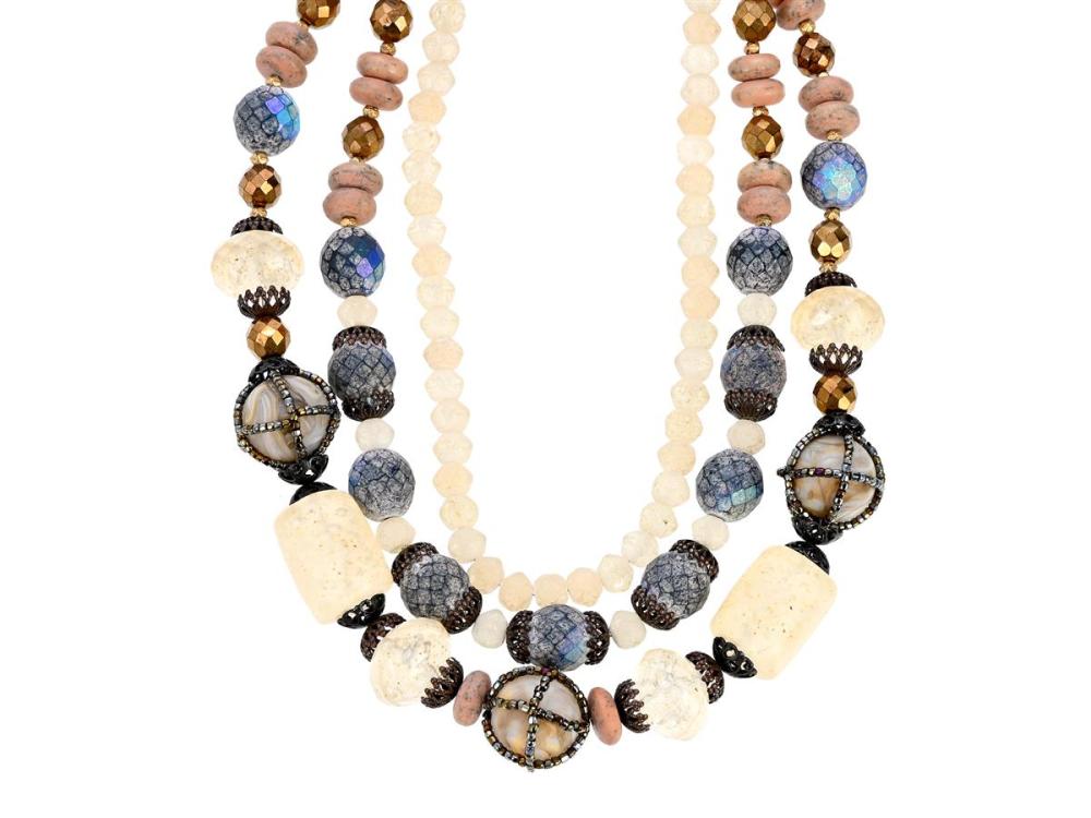 Jewellery

Necklace

NECKLACE, GIORGIO ARMANI, 3 strand, brass-coloured beads, multicolour stones, length 44 cm, weight 240 g, jewellery pouch, case.