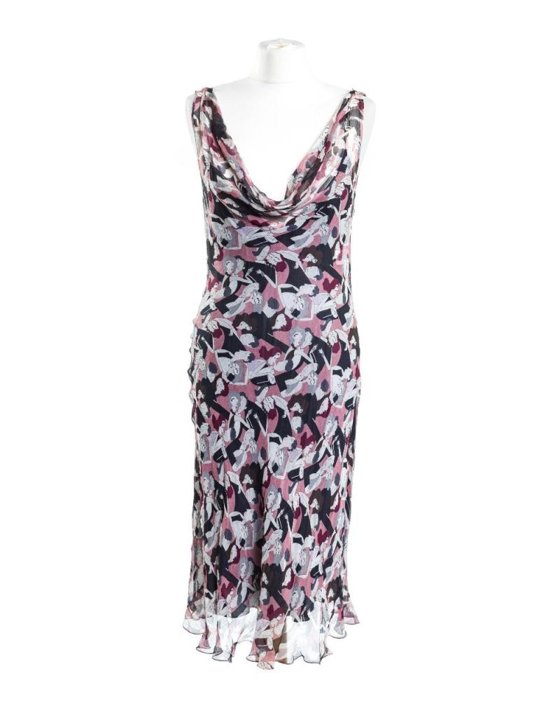 Description
Moschino Cheap and Chic by Franco Moschino. 

A vintage caricature-printed sleeveless midi dress, SS 2004, accompanied with a graphite slip dress, 100% silk to the caricature-printed sleeveless midi dress, and 100% rayon to the slip dress, both of Italian size 44 (approx. UK size 12)

(2)

Grade B

Provenance: The Casandra Collection