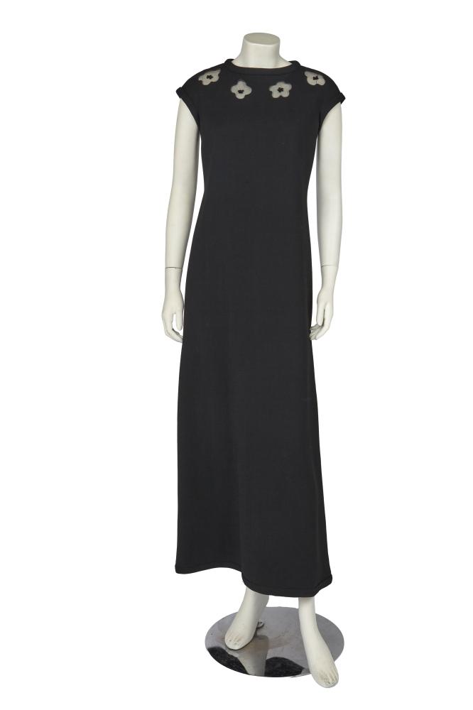 An André Courrèges black crêpe maxi dress, circa 1970

An André Courrèges black crêpe maxi dress, circa 1970

Couture Future labelled, size O, style 24037, the neckline with quatrefoil cut-outs backed in black mesh and adorned with sequins, bust 86cm 34in, waist 76cm 30in

Share this lot: