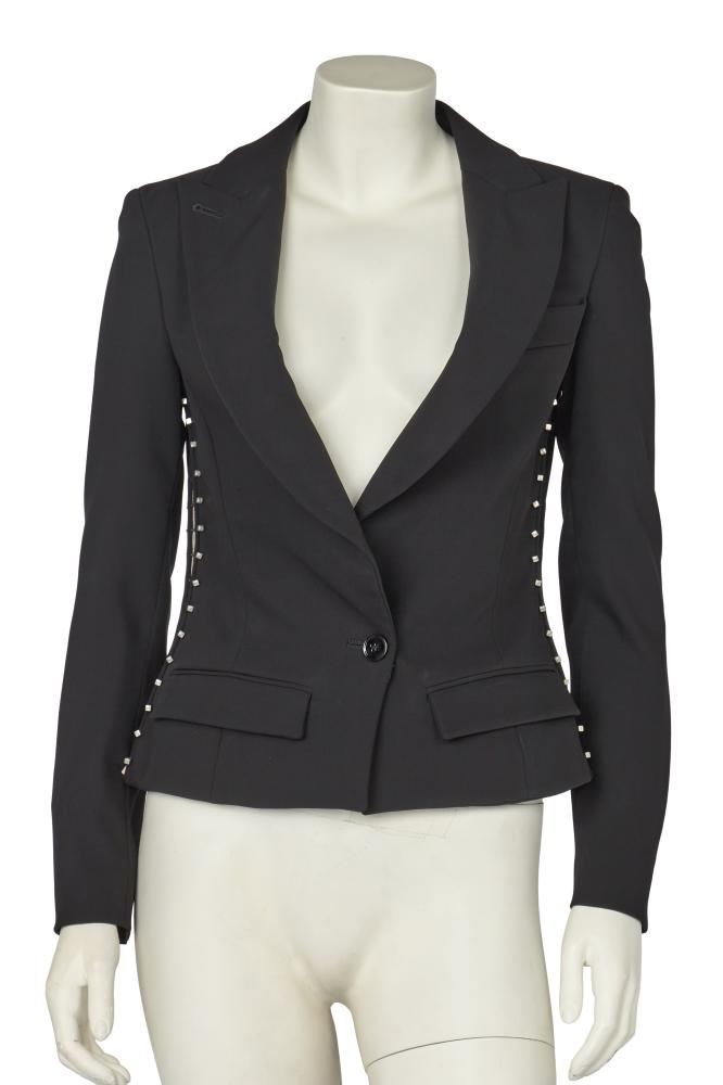 An Alexander McQueen black crêpe jacket with pinned side panels, commercial collection 2003

An Alexander McQueen black crêpe jacket with pinned side panels, commercial collection 2003

labelled, with long lapels, single button to fasten, the sides inset with pink/nude chiffon panels with metal pins down their length with square metal tips, bust approx 81cm 32in, waist 64cm 25in

Share this lot: