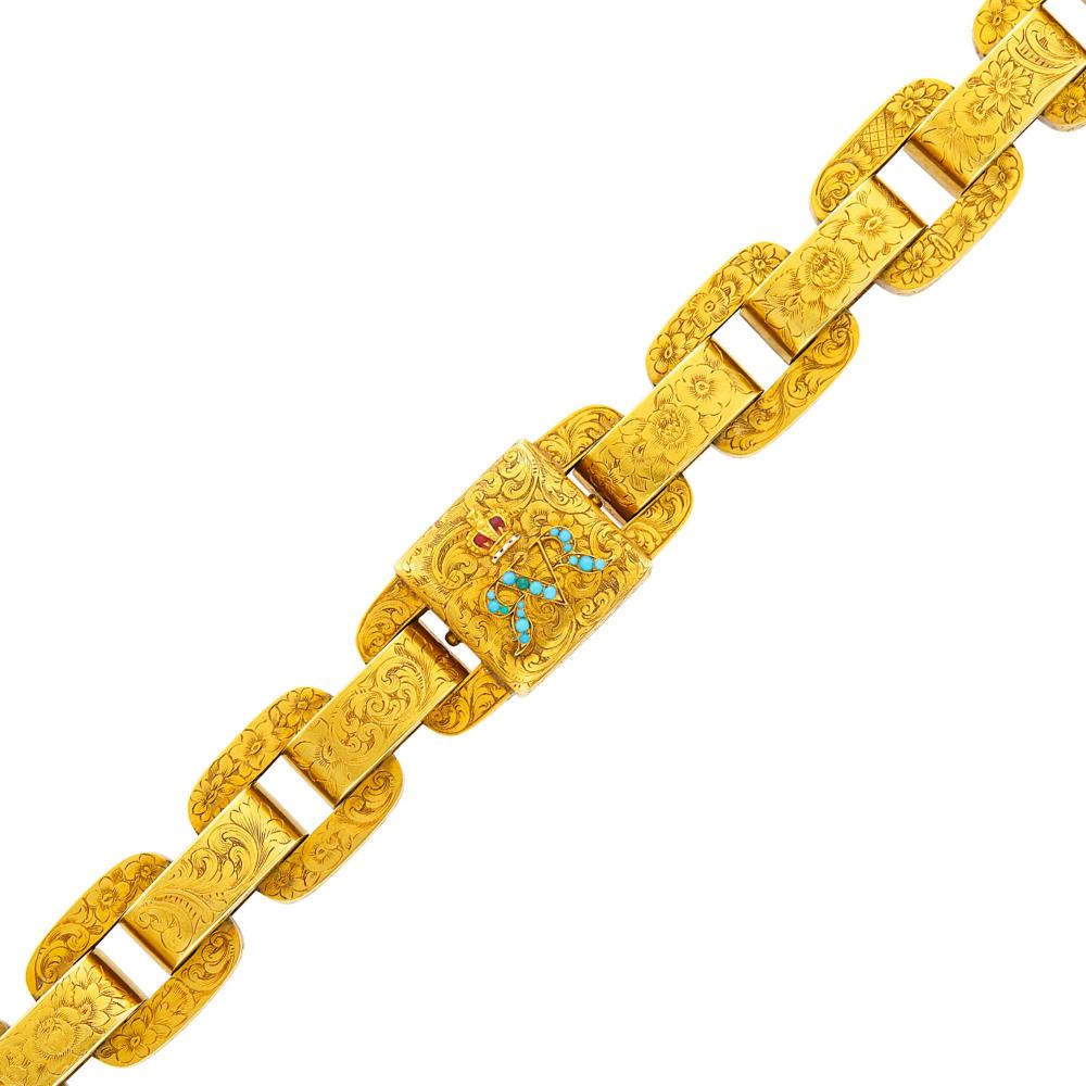Property from a Prominent Maryland CollectionSmall round turquoise, red, white and black enamel, engraved floral decoration on links, reverse with glazed compartment with woven hair, circa 1850, ap. 47 dwts. Length 7 1/2 inches.

Tests as 14 kt.Turquoise: medium deep turquoise blue to several greenish blue, good luster.Width of center panel 3/4 inch. Link width 11/16 inch.                            
Any condition statement is given as a courtesy to a client, is an opinion and should not be treated as a statement of fact and our Organization shall have no responsibility for any error or omission. Please contact the specialist department to request further information or additional images that may be available.