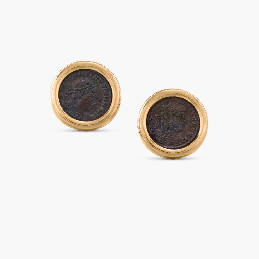 Bulgari

Each bezel-set with an ancient coin depicting the profile of Constantine II, two standing soldiers holding spears and shields either side of two Roman standards to the reverse, inscribed ’TREVIRI-CONSTANTINUS CAES. A.D. 316-337’.
